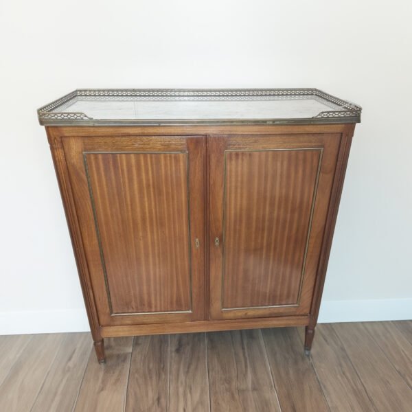 A wooden, louis sixteen, french antique buffet, with a white marble top and gallery